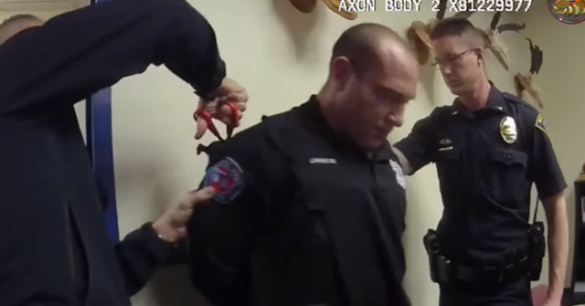 wife beating cop gets uniform cut off